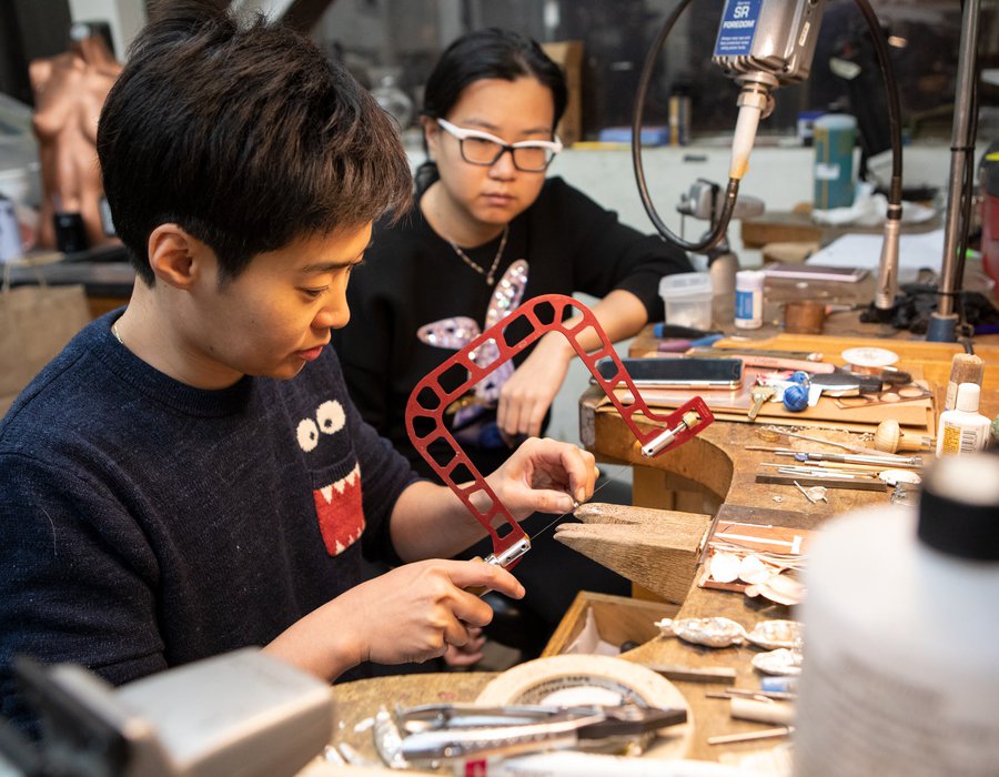 students working in the senior jewelry space