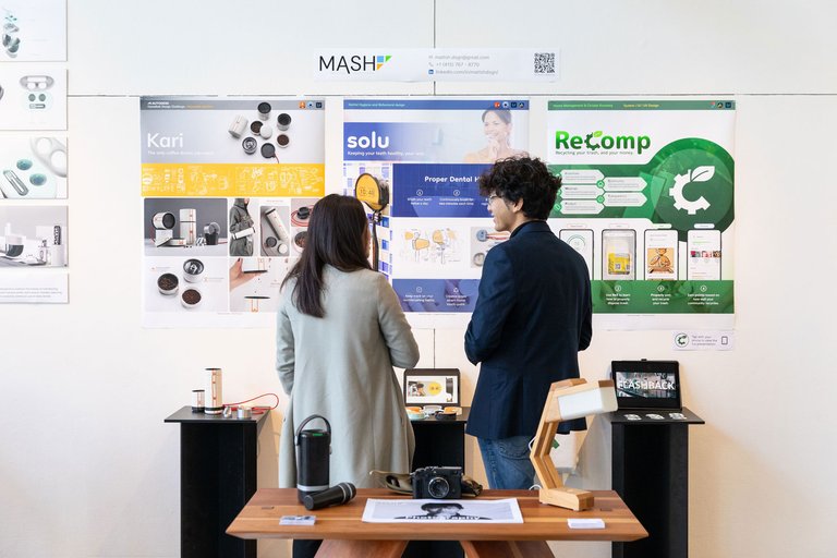 Students in front of the academic center sign in The Nave.