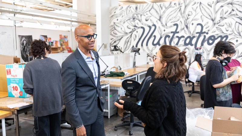 David Howse chatting in Illustration classroom.