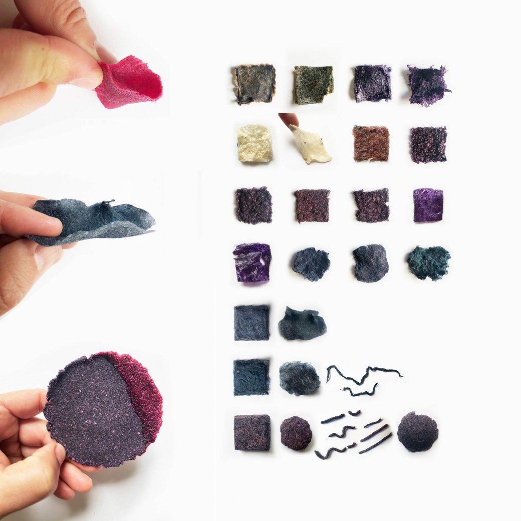 Different samples of a clay-like material in purples, greens, pinks, and blues.