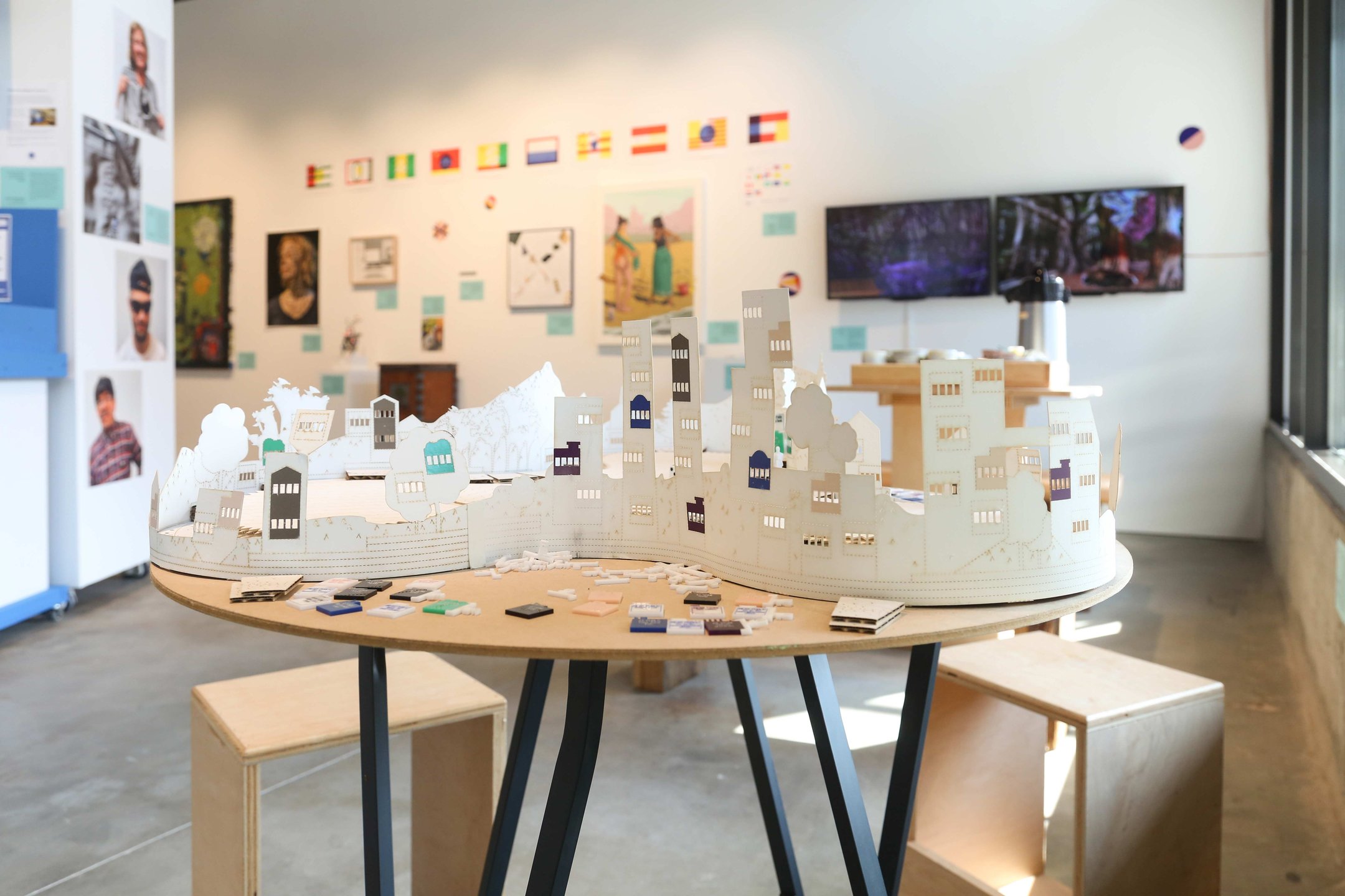 A photo of a city composed of paper cutouts.