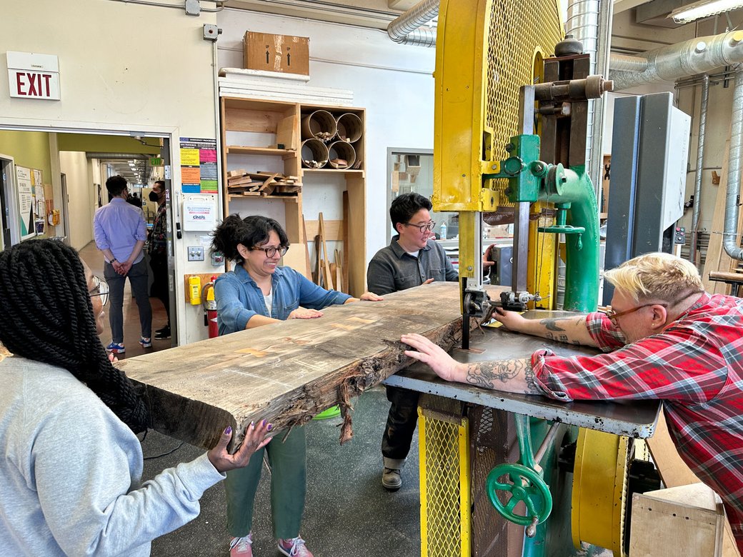 Kathy Lam working on Belonging Benches with the CCA community.