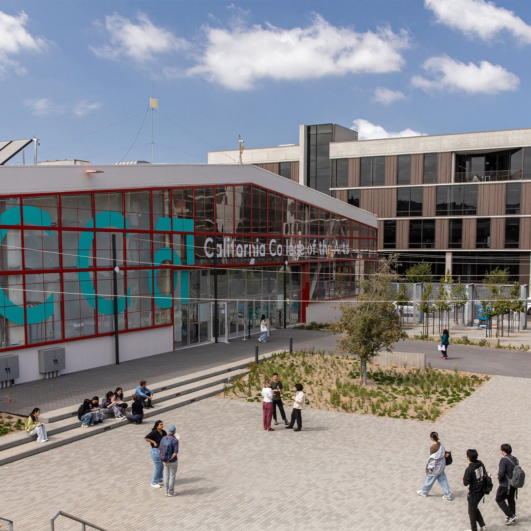 Exterior of CCA's entrance and main quad with students milling around.