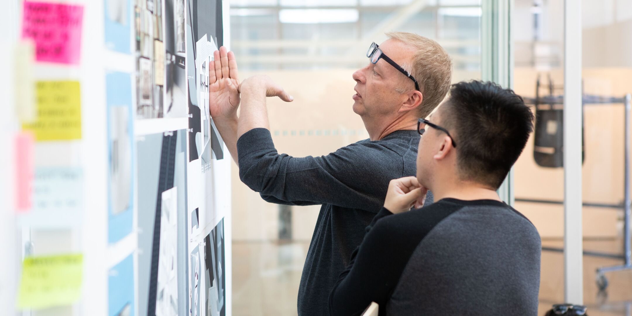 Architecture Dean Keith Krumwiede providing feedback on a students midterm.