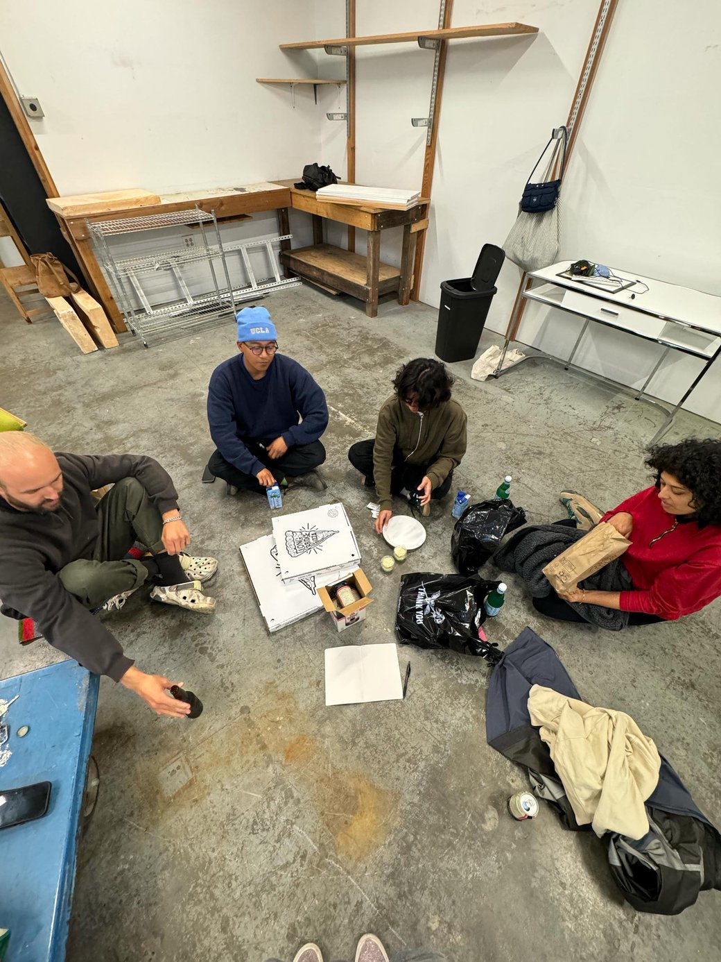 Cole, Andrew, Maria and Sav planning the layout in the new Bayview Studio in 2024