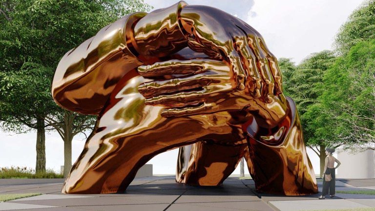 Hank Willis Thomas’s winning design "The Embrace" features pairs of arms and hands that appear to clasp one another.
