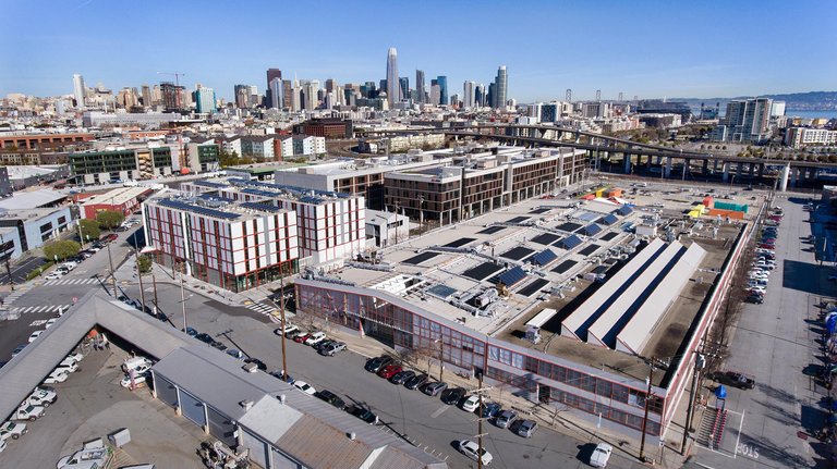 An overhead view of the CCA campus with San Francisco in the background.