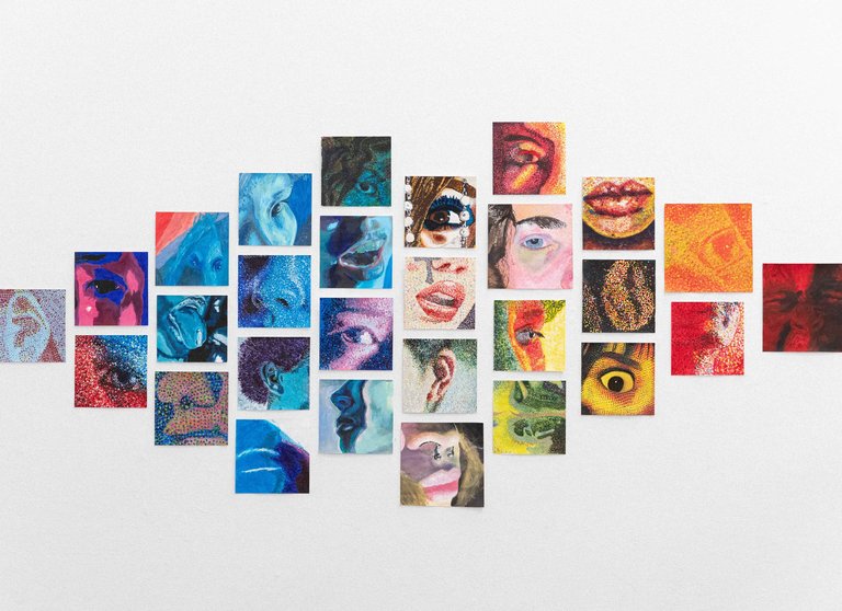 A rainbow-colored collage of paintings featuring various facial features