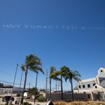 Sky-typed message of the words Not Forgotten over Terminal Island in San Diego