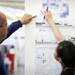 AA: Student and Faculty at Wall