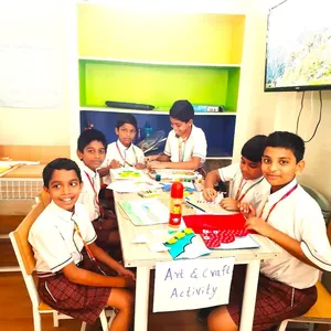 Dhatrak model school logo