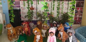 Rising Kids Pre School logo