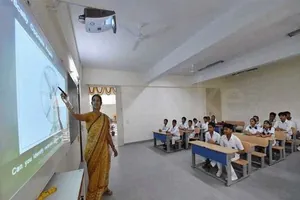 Shanthi Nikethan School logo