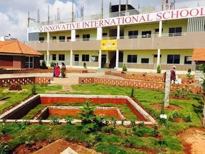 Innovative International School and PU College logo