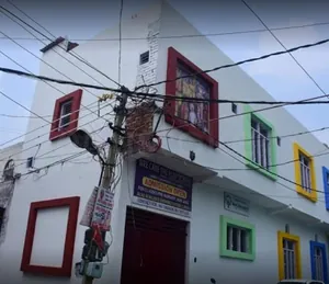 Wee Care Play School logo