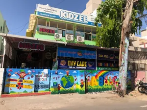 Kidzee Satellite And Moon Stars Daycare  logo