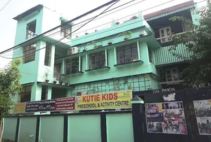 Kutie Kids Pre School logo