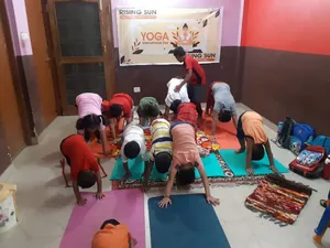 Rising Sun Play School logo