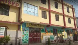 OK MODEL SCHOOL logo