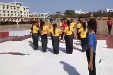 AJMERA MUKESH NEMICHAND BHAI ENGLISH MEDIUM SCHOOL logo