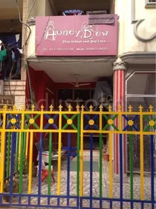 HONEY DEW PLAY SCHOOL & DAY CARE logo