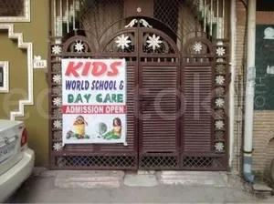 KIDS WORLD SCHOOL logo