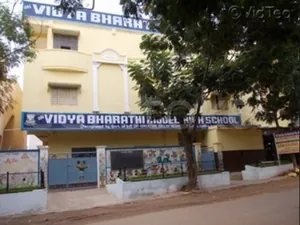 Vidya Bharathi Model High School logo