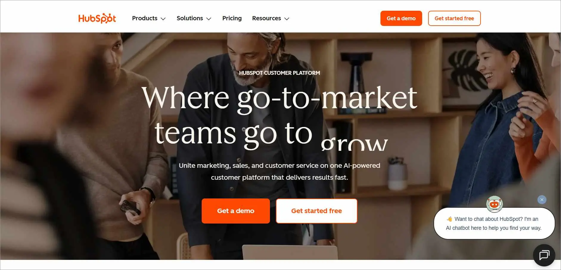 HubSpot webpage with headline “Where go to market, teams go to grow,” featuring contact management, free trial, and demo options.