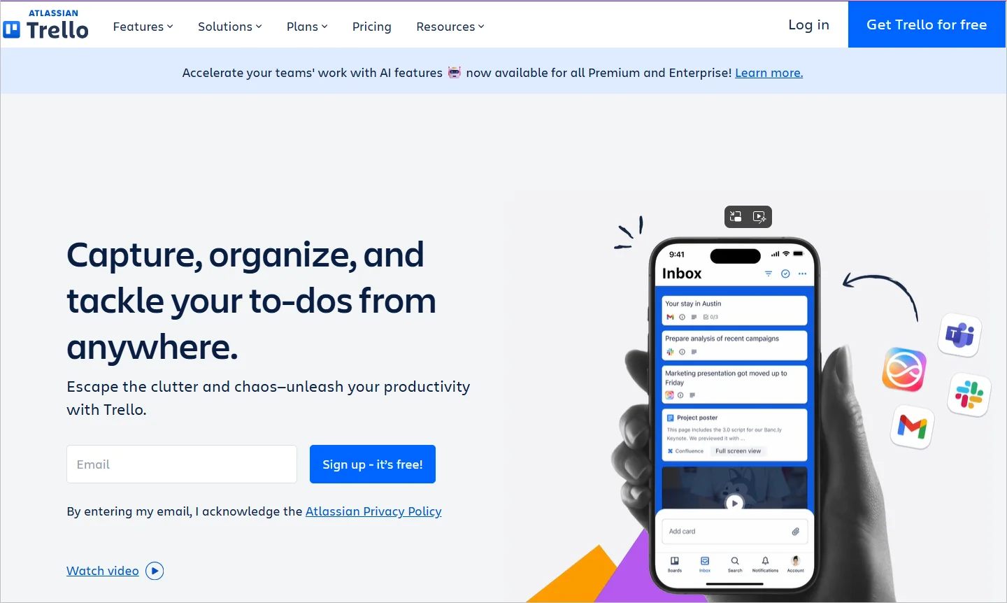 Trello webpage showing the text “Capture, organize, and tackle your to‑dos from anywhere” with a phone preview of the Trello inbox and app icons.