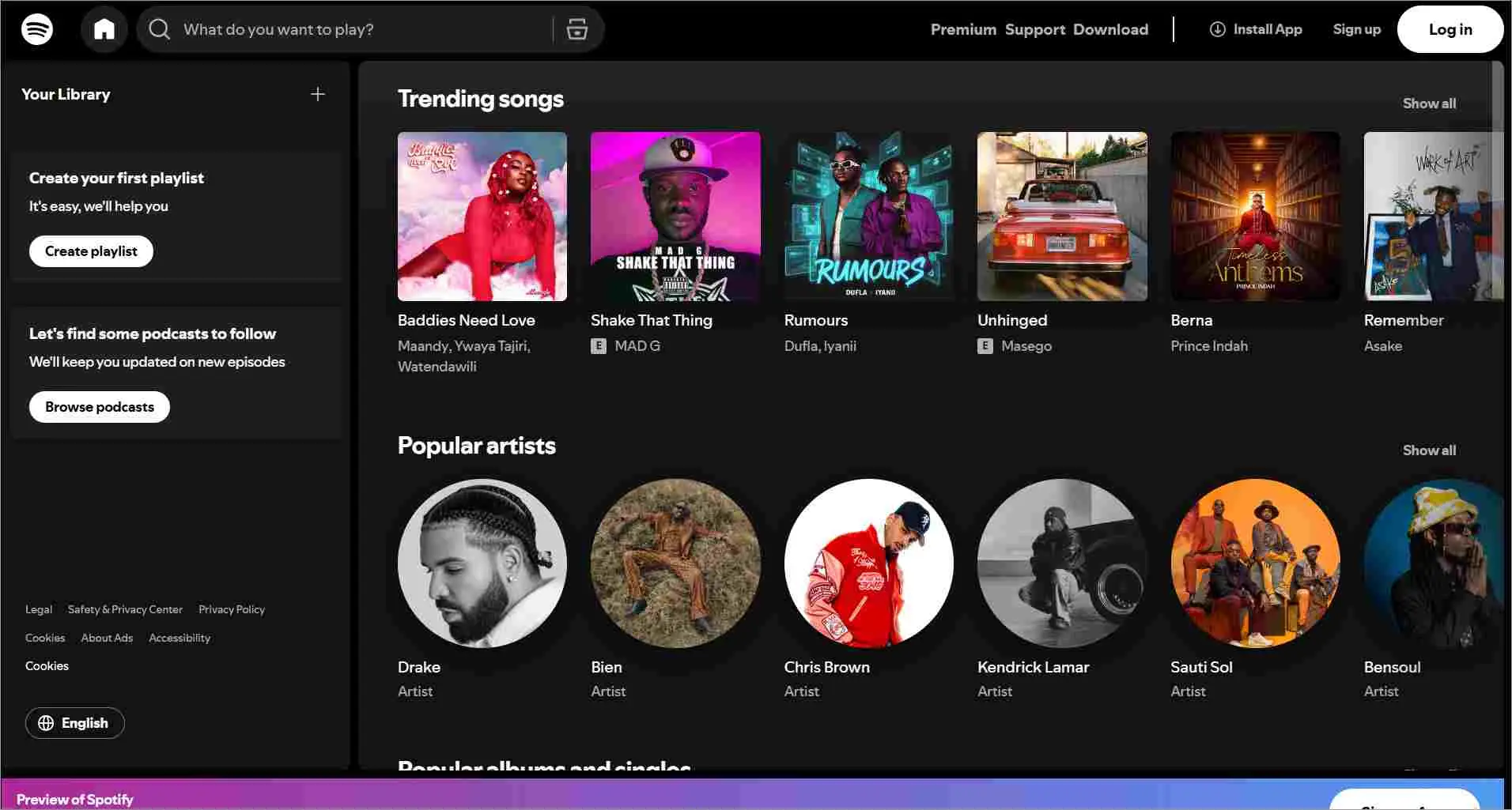 Spotify web interface displaying the home screen with sections for ‘Trending songs’ and ‘Popular artists.’ The trending songs row includes album covers for tracks such as ‘Baddies Need Love,’ ‘Shake That Thing,’ ‘Rumours,’ ‘Unhinged,’ ‘Berna,’ and ‘Remember
