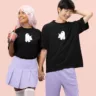 Cute spooky ghost in love Couple Tees| Adorable Matching Tshirts - Get ready for a cupid's carnival with our playful 'Love Struck' Couple Tees, where a charming girl takes aim with her love arrows, and the boy finds himself irresistibly struck by the arrows of affection.