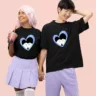 Spooky Snuggly Couple Tees for your Boo!| Adorable Matching Tshirts - Get ready for a cupid's carnival with our playful 'Love Struck' Couple Tees, where a charming girl takes aim with her love arrows, and the boy finds himself irresistibly struck by the arrows of affection.