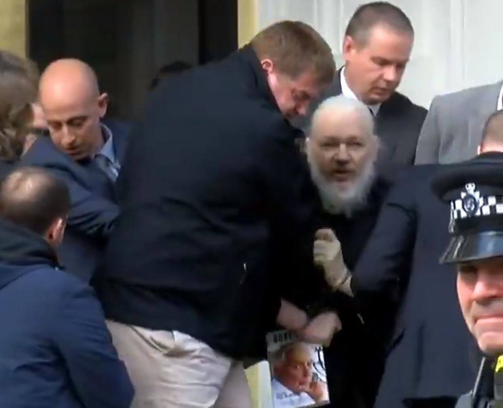 Julian Assange carried out of Ecuadorean Embassy