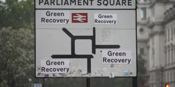 Greenpeace activists replace the destinations on the road signs around Westminster to read ‘Green Recovery’. Sending a message to the government that it only has one option with its economic recovery package, and that much greater investment is needed to green the transport, energy, housing and waste sectors, create new green jobs and tackle the climate emergency.