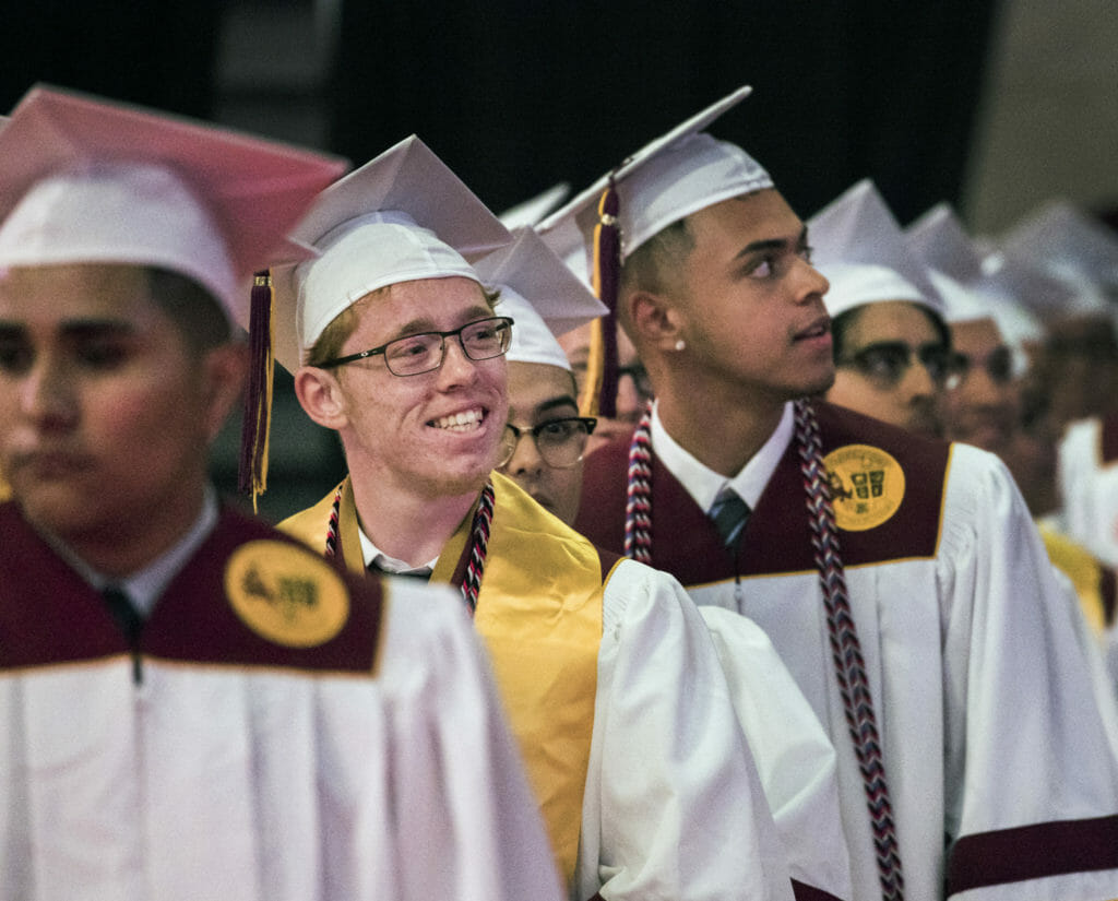 Students in caps and gowns at Eldorado High School graudation