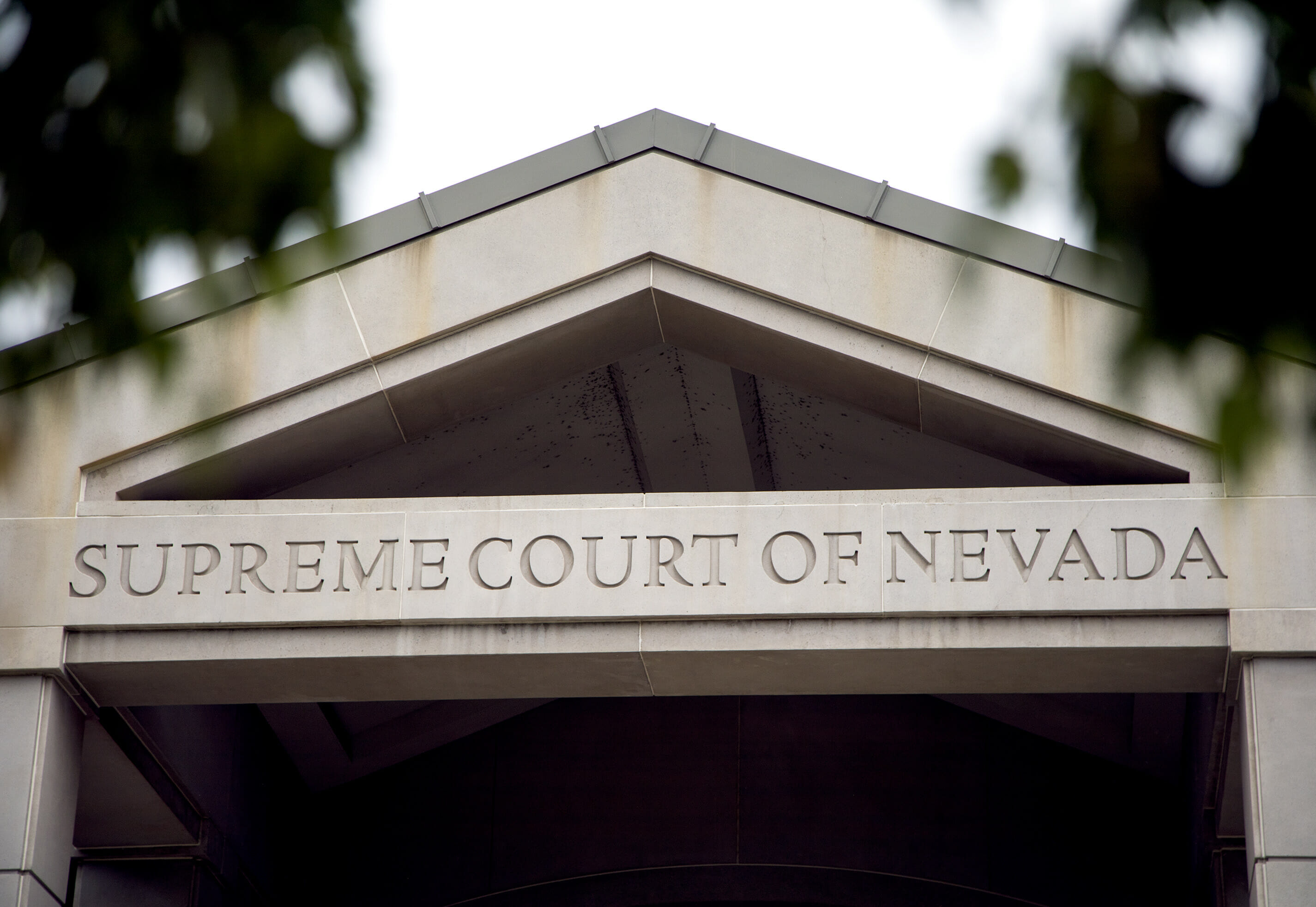 Photo of the top front of the building with the words Supreme Court of Nevada