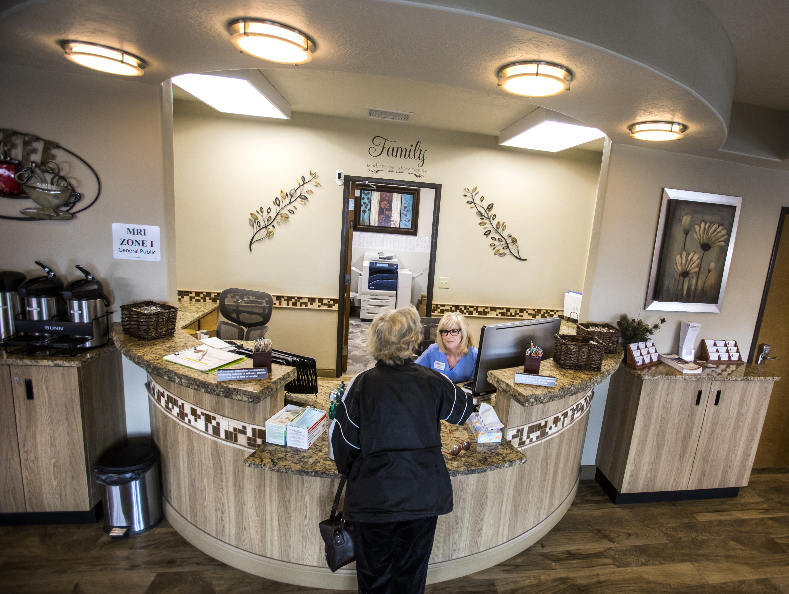 A patient checks in at an urgent care