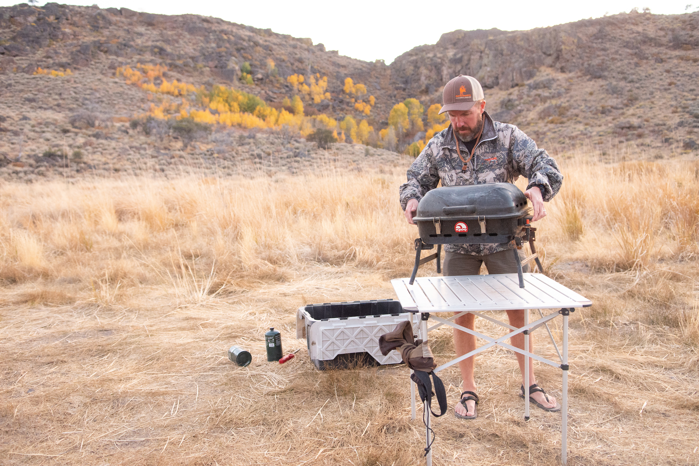 Reno City Councilman David Bobzien sets up a stove at camp in the Sheldon National Wildlife Refuge