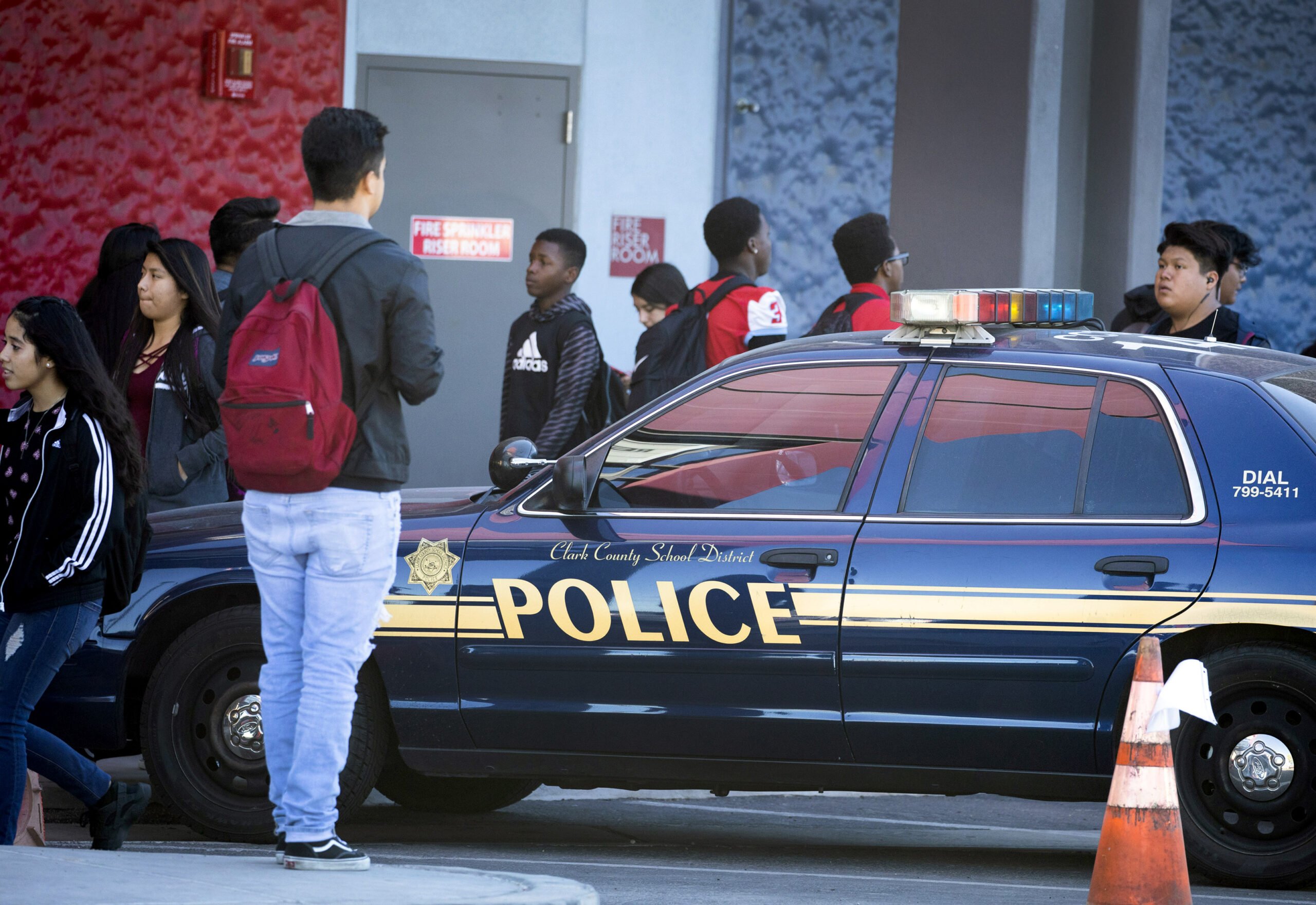 Western High School students walk past a Clark County School District Police car on Friday, Oct. 19, 2018. (Jeff Scheid-Nevada Independent).