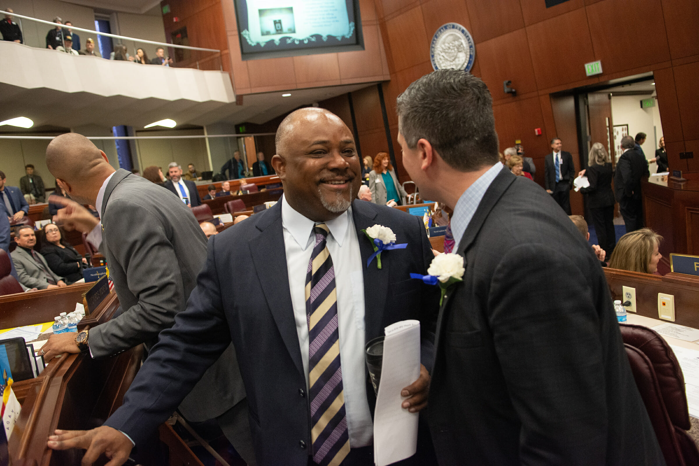 Assembly Speaker Jason Frierson speaks with Assemblyman Steve Yeager