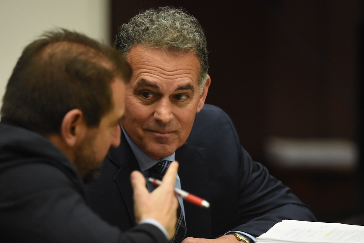 Danny Tarkanian and an attorney sitting together