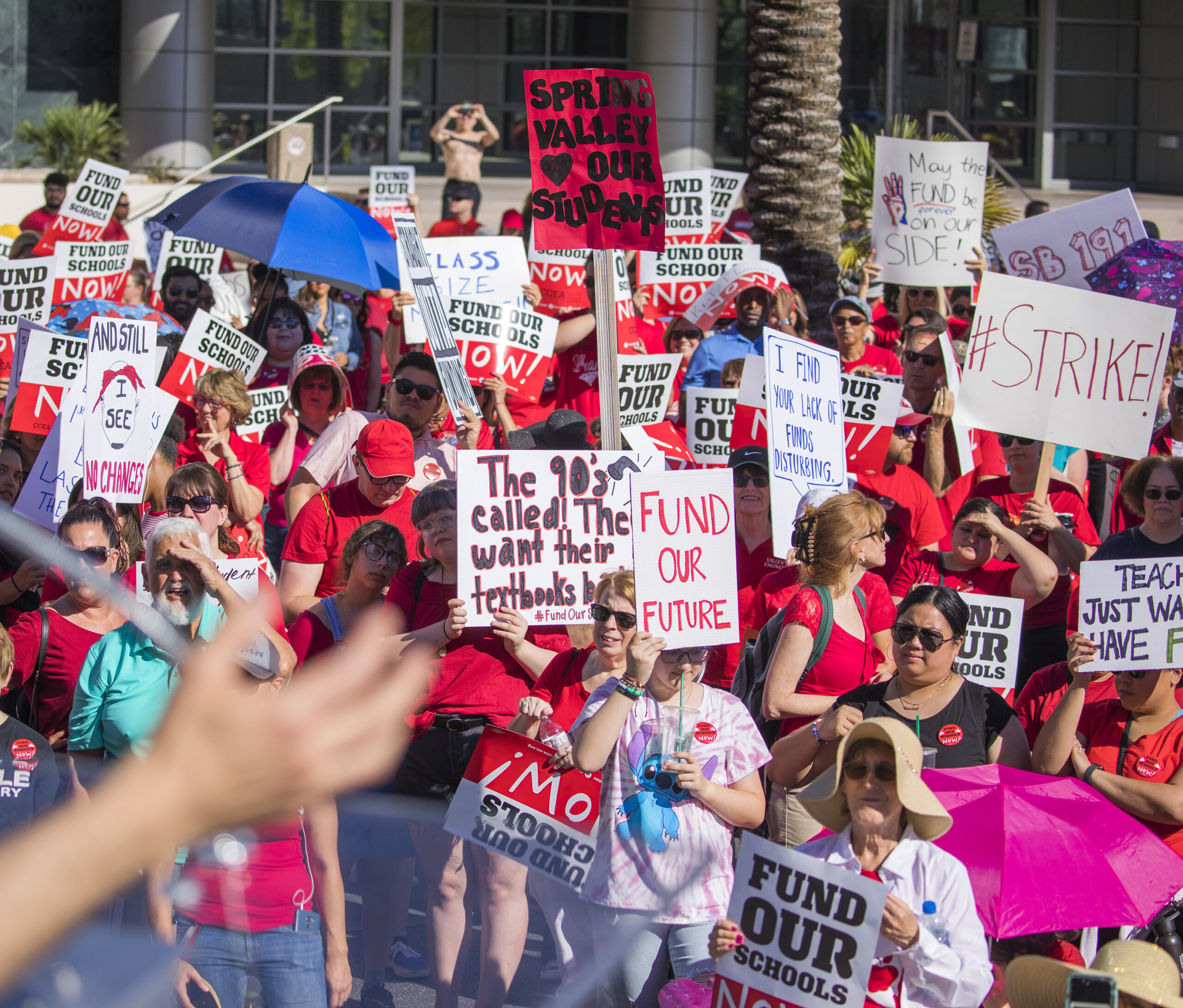 Signs at teachers union rally