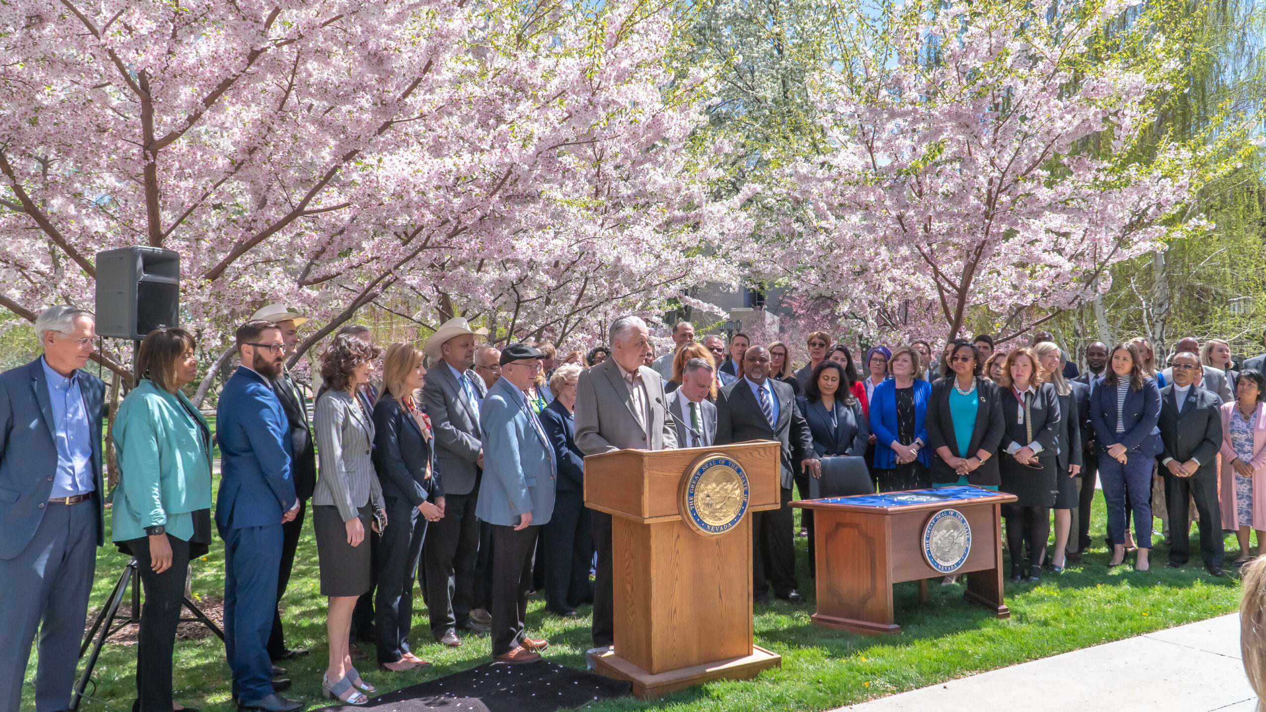 Gov. Sisolak speaking outside, in front of the Nevada Supreme Court on Earth Day before signing SB358 to raise the renewable portfolio standard.