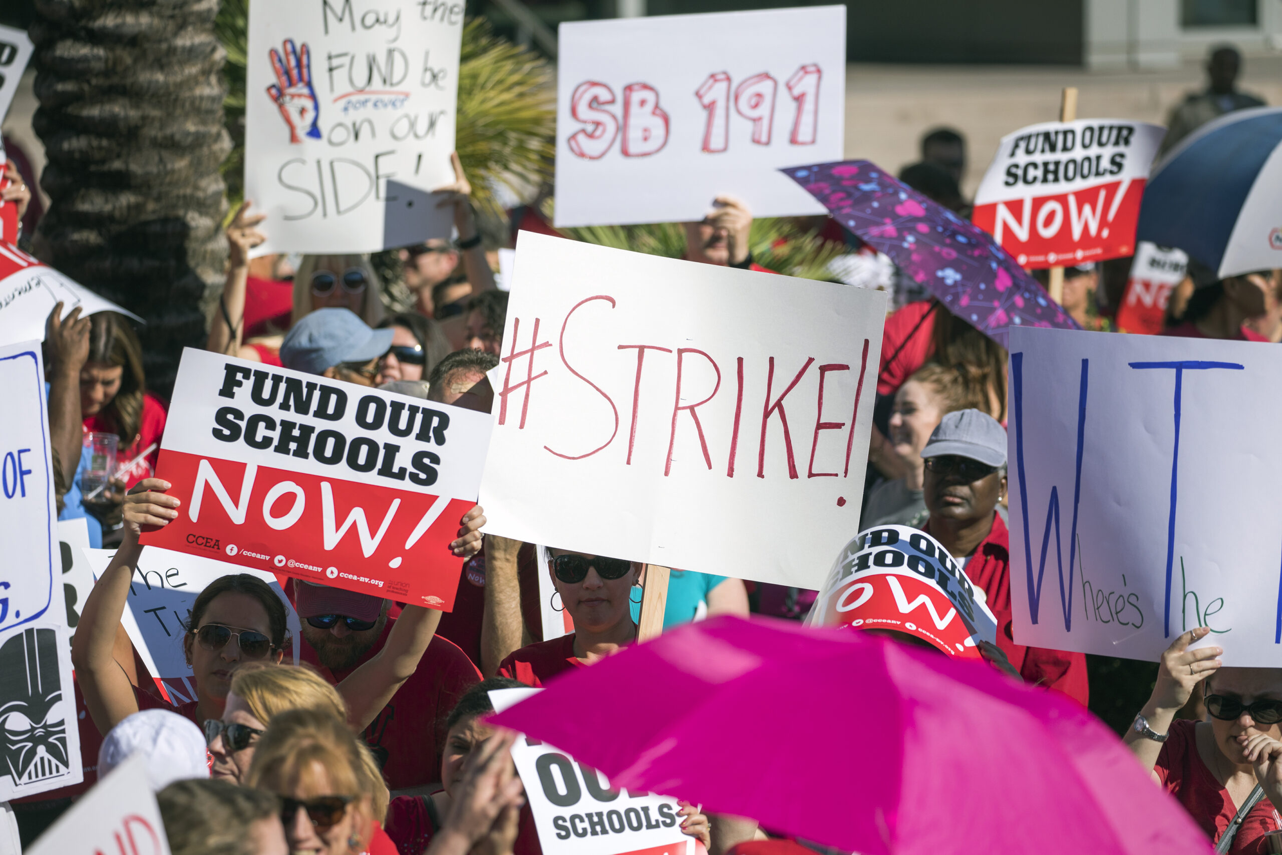 Signs calling for teacher strike