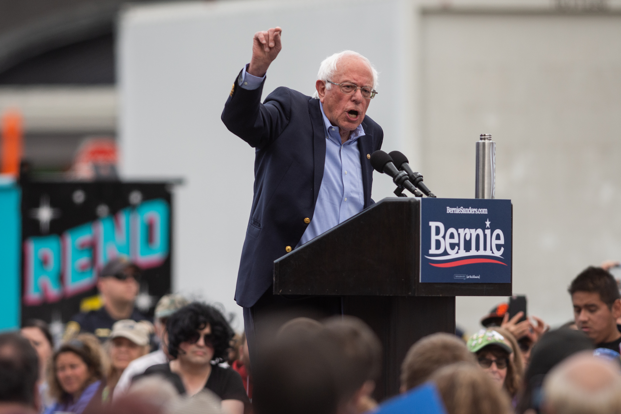 Bernie Sanders at a podium during a rally