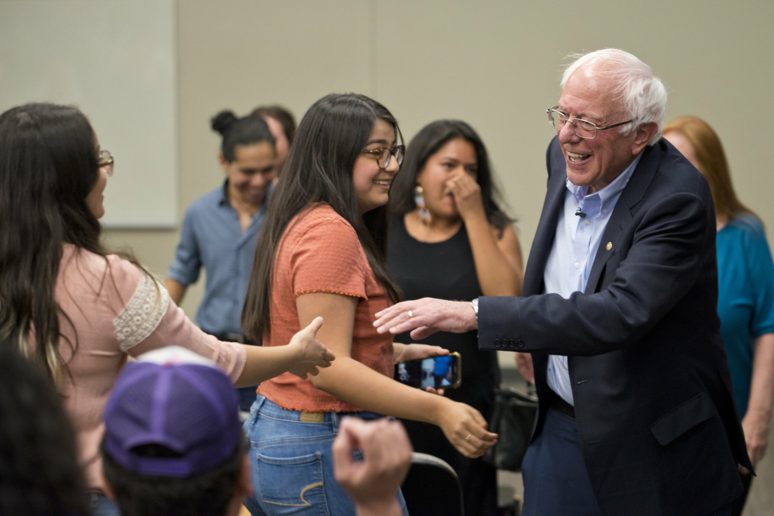 Democratic presidential candidate Sen. Bernie Sanders greets a supporter at a Mijente's El Chisme 2020 event at UNLV in Las Vegas