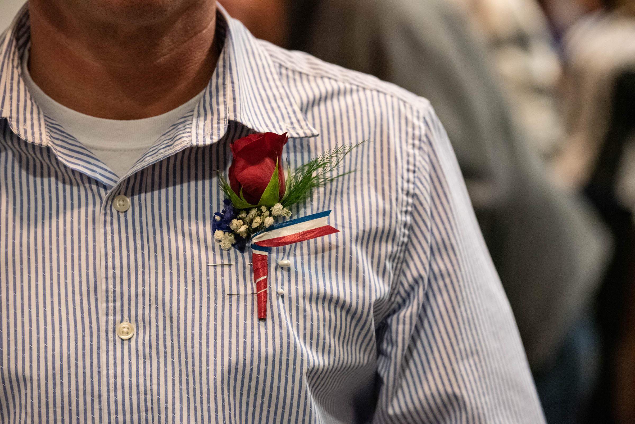 Veterans court graduate wears boutonniere