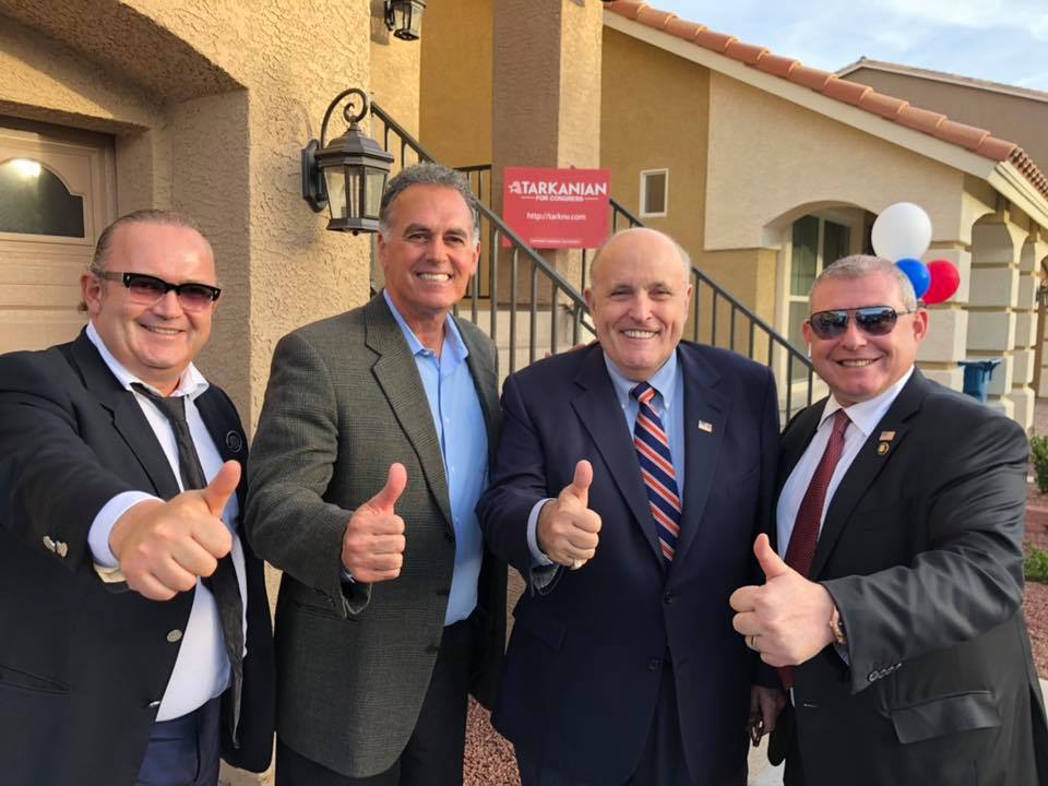 A photo shared on former congressional candidate Danny Tarkanian's Facebook page showing him posing with Igor Fruman (far left), Lev Paranas (far right) and former New York City Mayor Rudy Giuliani.