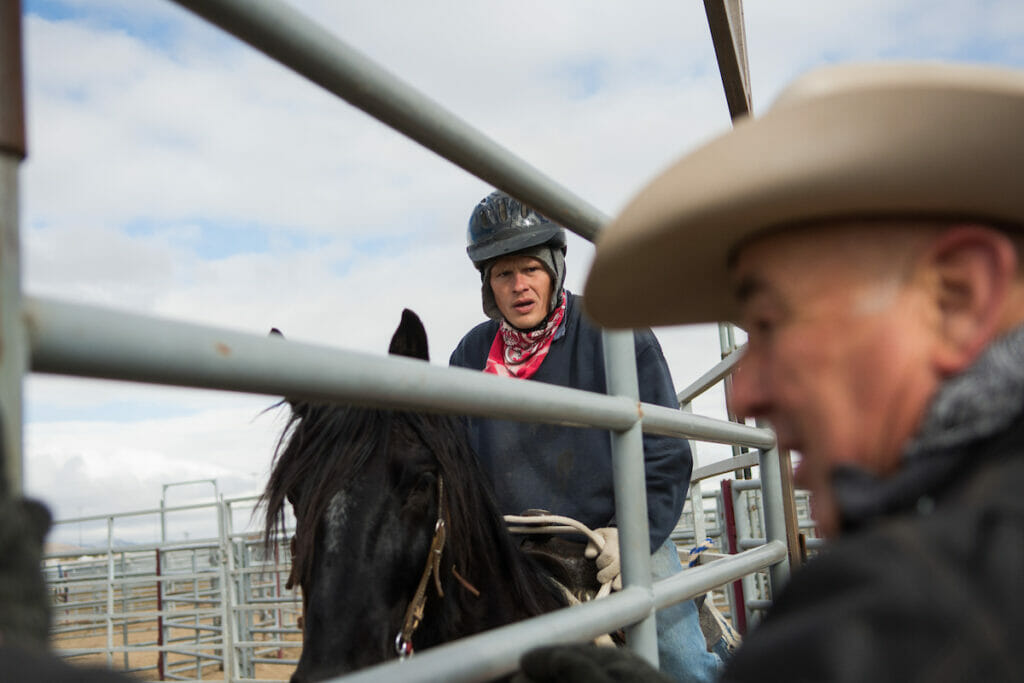 Inmate talking with cowboy