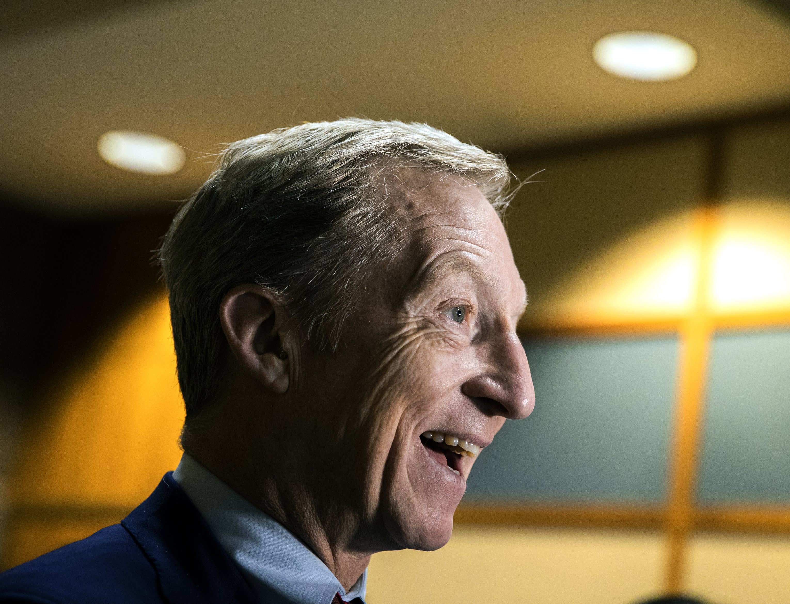 Tom Steyer talks to reporters